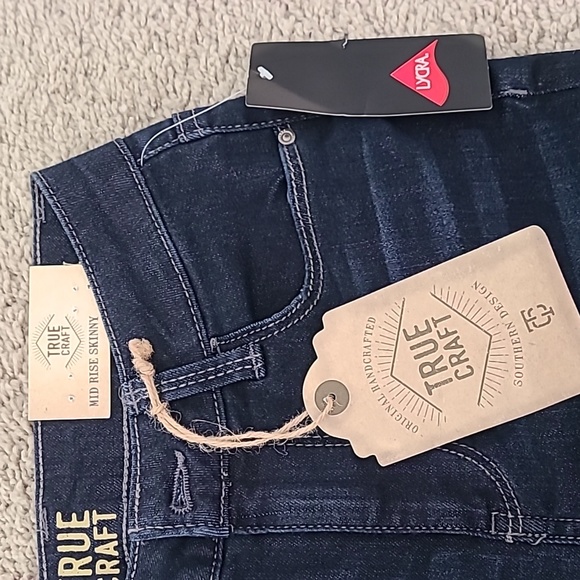 Mid Rise Skinny Jeans - Picture 2 of 14